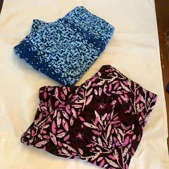 Two pair of Lularoe leggings Purple and blue designs One size