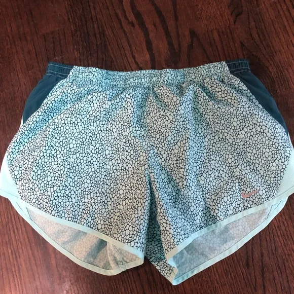 - Nike running shorts. Aqua and teal. Size Small