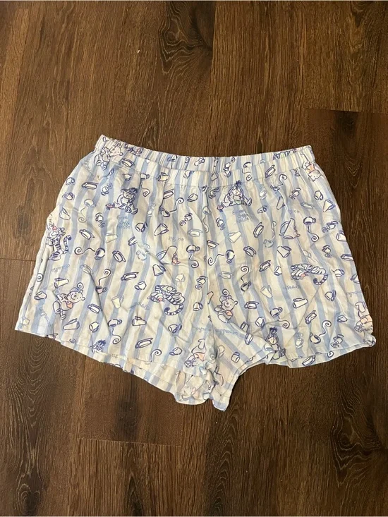 y2k winnie the pooh pajama pattern of characters like Tigger and Winnie the Pooh