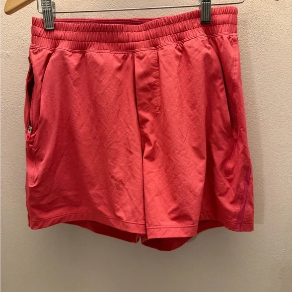 Lululemon Pace Breaker Shorts Coral Pink Mesh Vent Zipper Pockets Size S LM7BC0S