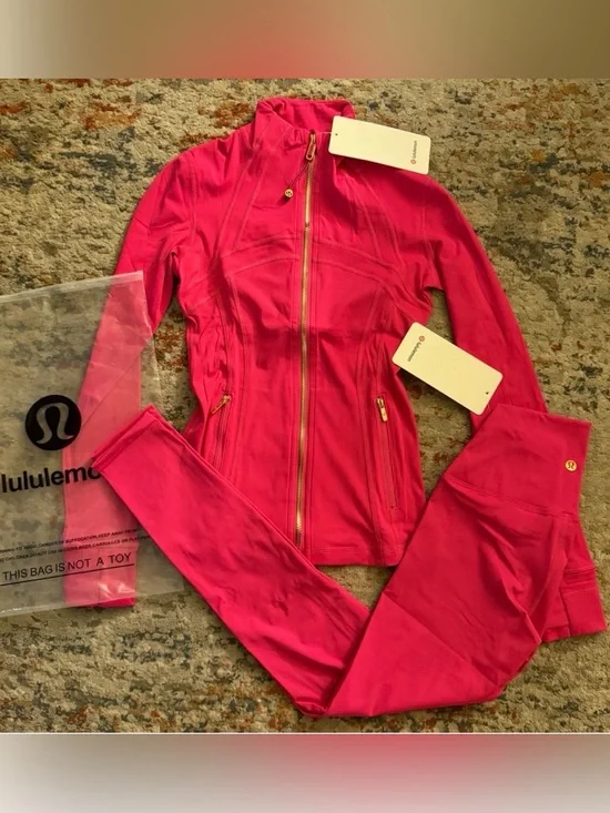 lululemon bright pink jacket with gold zipper