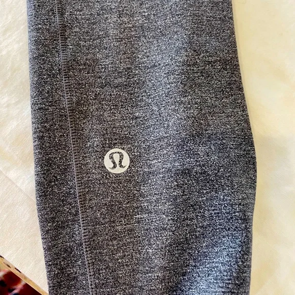 Lululemon athletic‎ gray leggings. Repair done on the right leg. See picture.