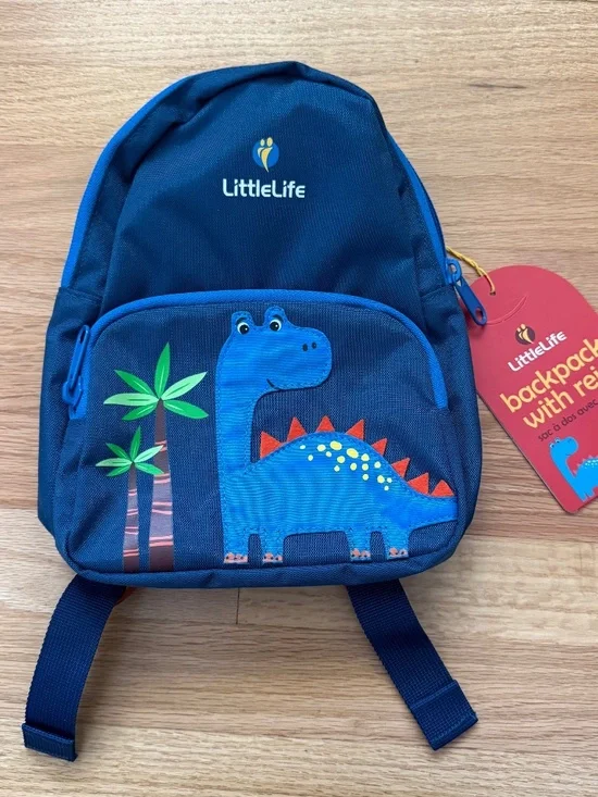 New LittleLife Dinosaur Friendly Faces Toddler Small Backpack with Rein in Blue