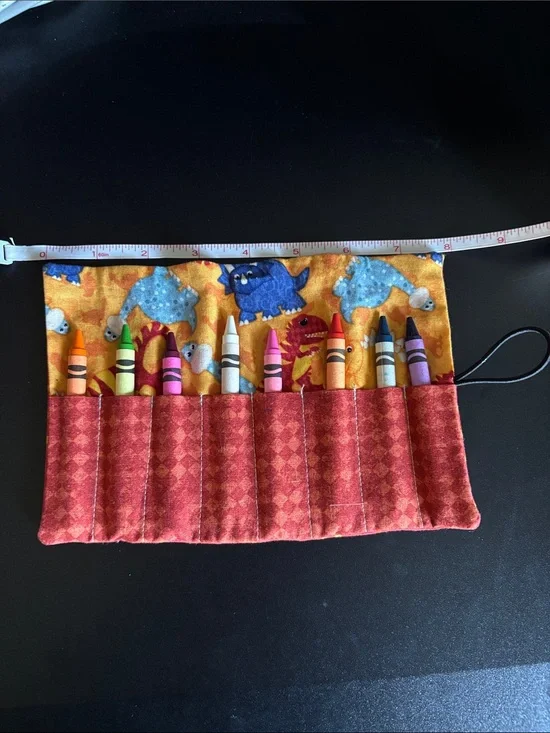 Kids Crayon Roll-Up Case Dinosaurs in Yellow and Red
