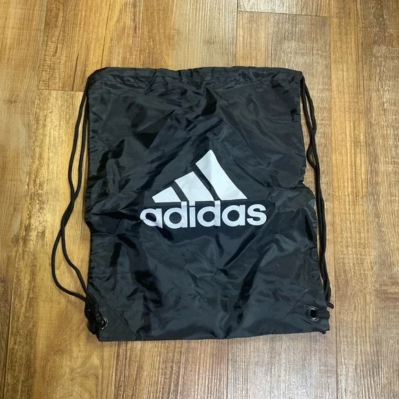 Adidas black & white sling bag