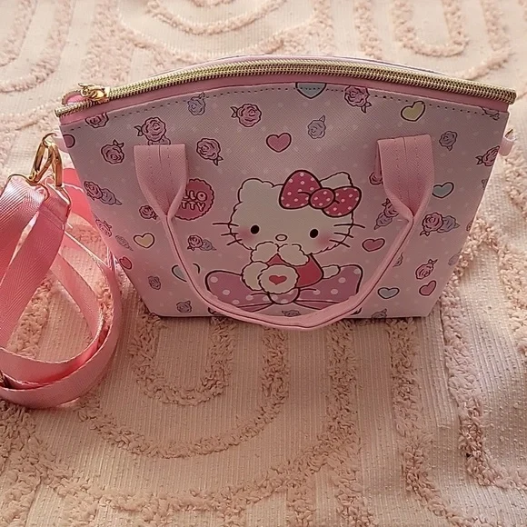 Hello Kitty Handbag with adjustable shoulder strap, pink 💗.  NWOT.