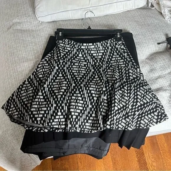 Aqua(Bloomingdales) black and white patterned circle skirt.
