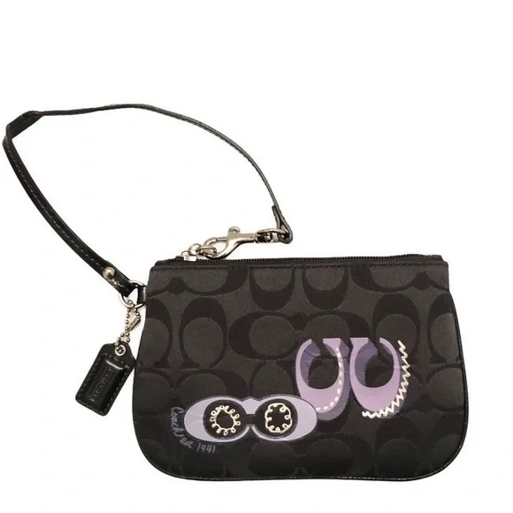 Coach black signature appliqué wristlet clutch