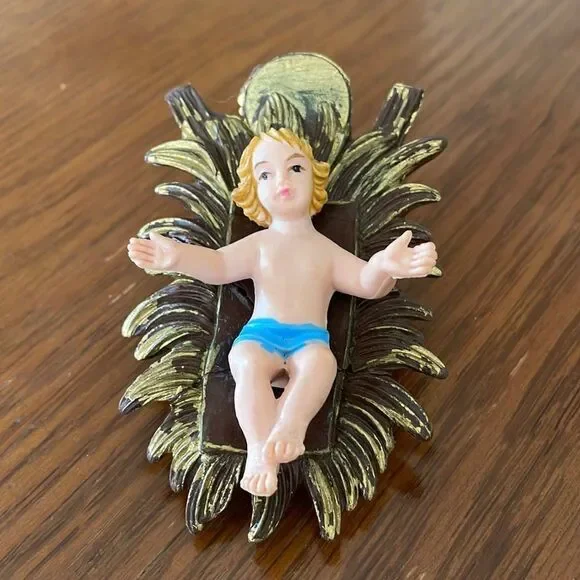 Vintage plastic baby Jesus in manger bed‎