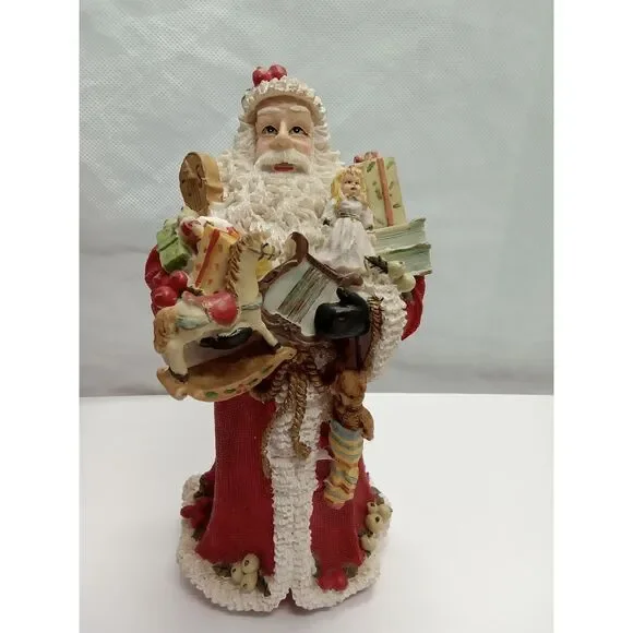 Santa Figurine  ceramic‎ holding gifts appox 9x5x5