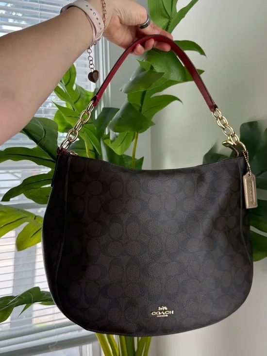 Coach Black Signature Hobo Bag with Red Strap