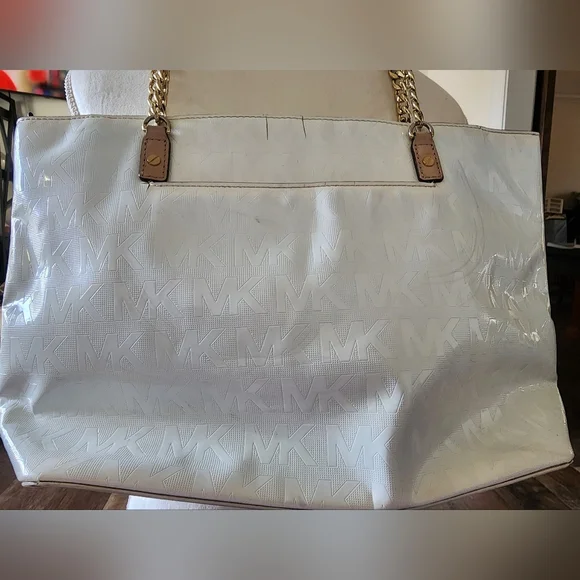 Preowned fair condition Michael Kors white monogrammed‎ tote bag