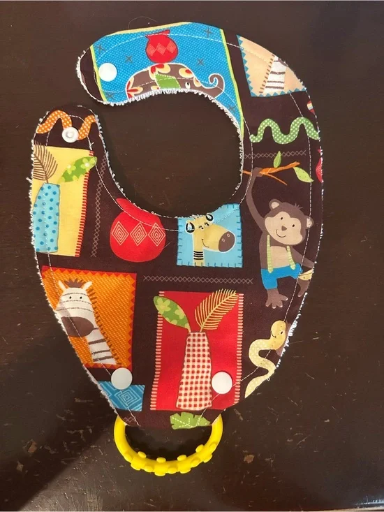 Handmade Jungle Animals bib with ring