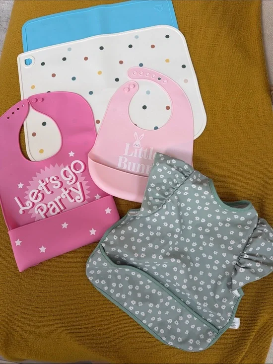 Girls assortment of bibs and placemats