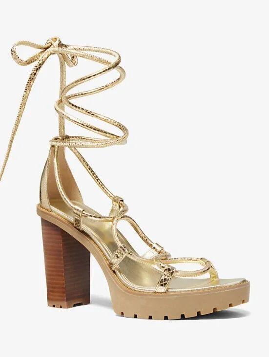 Michael Kors Vero Lug Platform Sandals in a metallic gold finish. Size 7.5