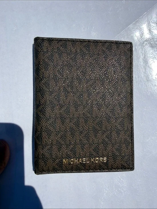 Michael Kors Brown Monogram Passport Cover with Gold Logo