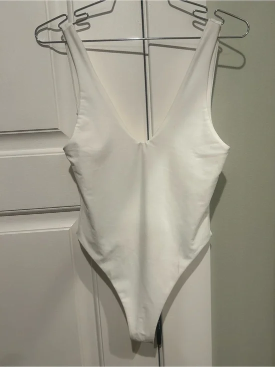 Sleek White V-Neck One-Piece Swimsuit