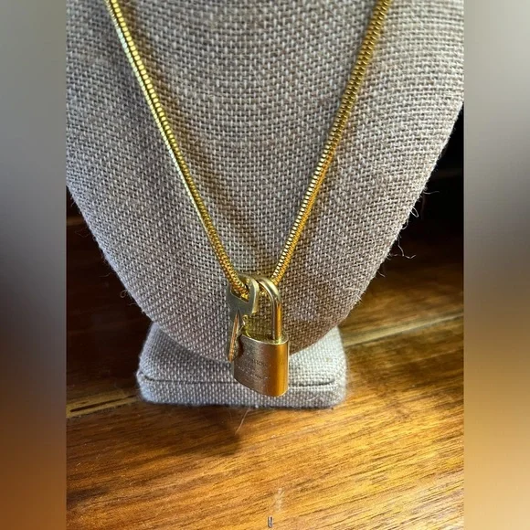 Louis Vuitton Gold Lock On off brand chain No 316 Works. Authentic