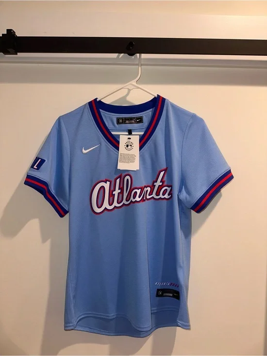 Women’s Nike Atlanta City Connect Baseball Jersey with Red, White & Blue Trim.