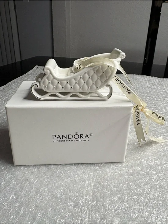 Pandora white porcelain sleigh ornament