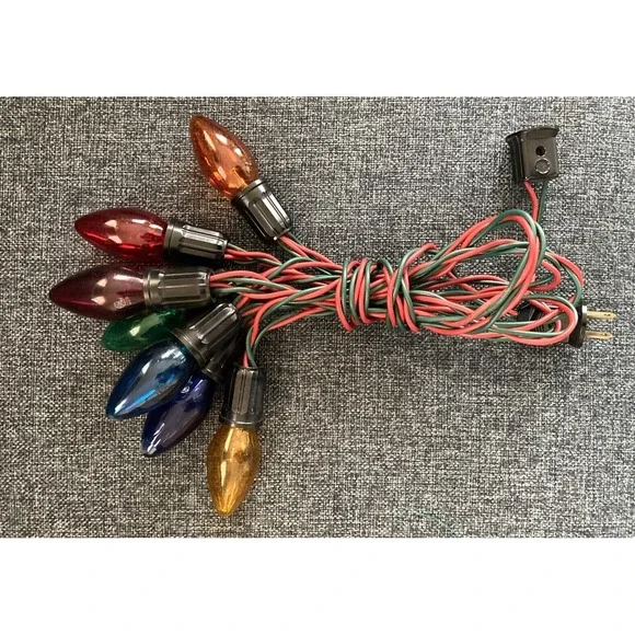 Vintage Noma Christmas string lights 7 bulb C9 translucent colors plastic cord