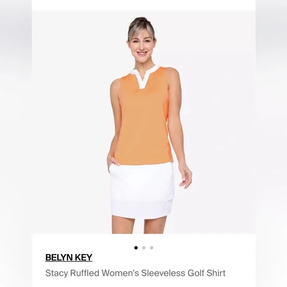 Belyn Key Stacy  Sleeveless ruffle neck golf  Top in cantaloupe. NWT. Retail 108