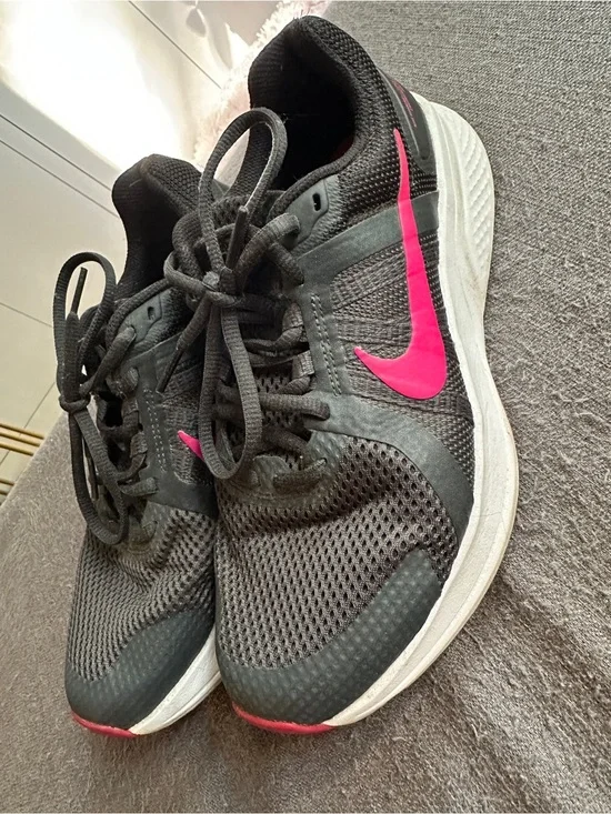 Nike Women's Black Athletic Shoes with Pink Swoosh