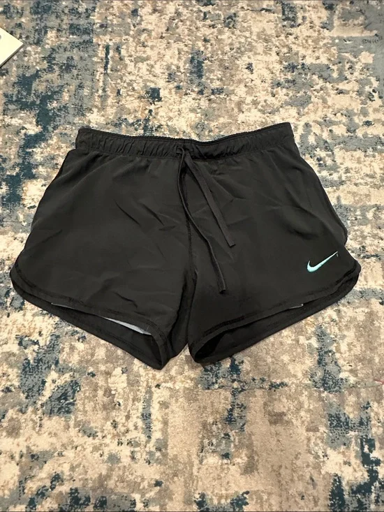 Nike Women's Black Athletic Shorts with Teal Swoosh