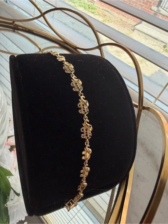 Gold Tone Elephant bracelet with multi color accents