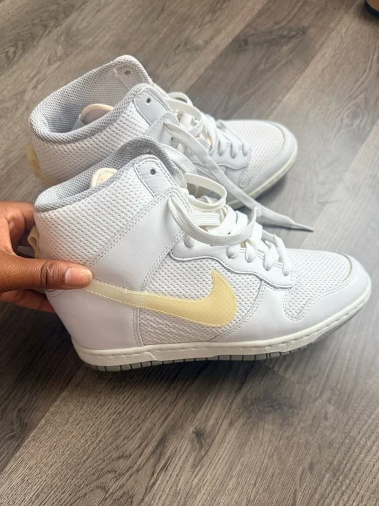 Nike White High-Top Sneakers with Pale Yellow Swoosh