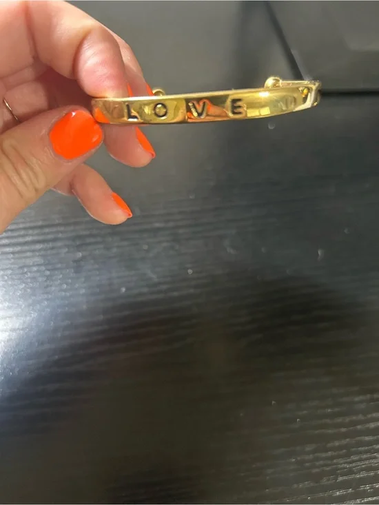 Kinsley Armelle Gold LOVE Engraved Bangle Bracelet