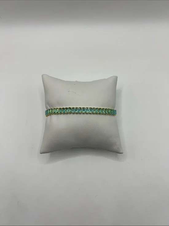 524. 18k Gold Plated over Brass Bracelet with Aquamarine Cubic Zirconias 7”