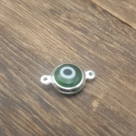 Evil eye token charm‎