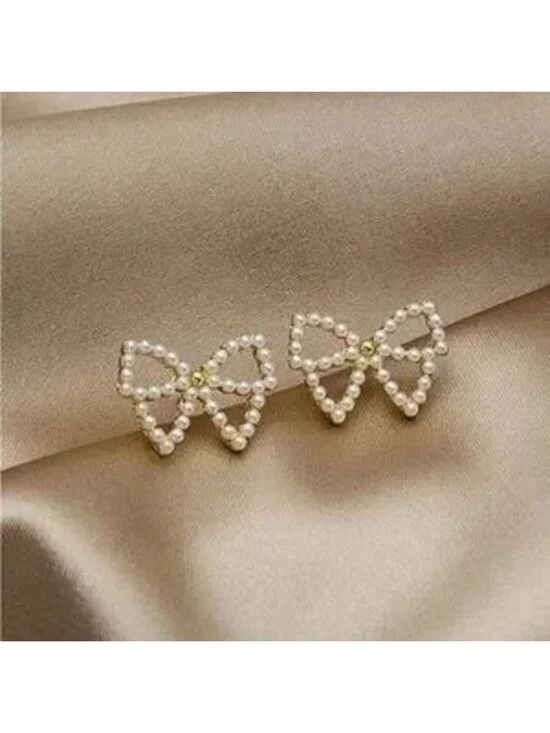 Gold Pearl Bow Tie Earrings