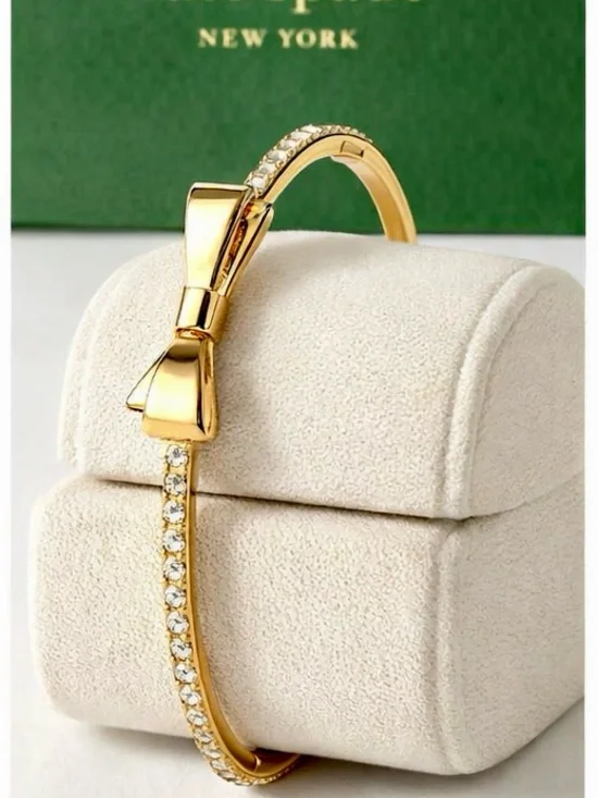 Kate Spade New York Gold-Tone Bow Bangle Bracelet with Crystal Accents