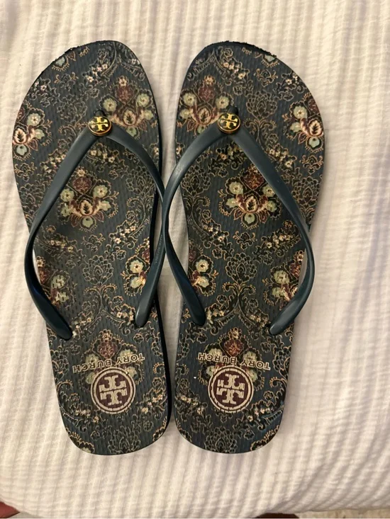 Tory Burch Navy Floral Logo Flip Flops with Gold Emblem