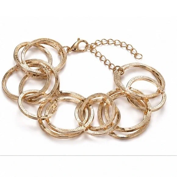 Gold Tone Interlocking Multi Ring Link Bracelet Hammered Texture Adjustable