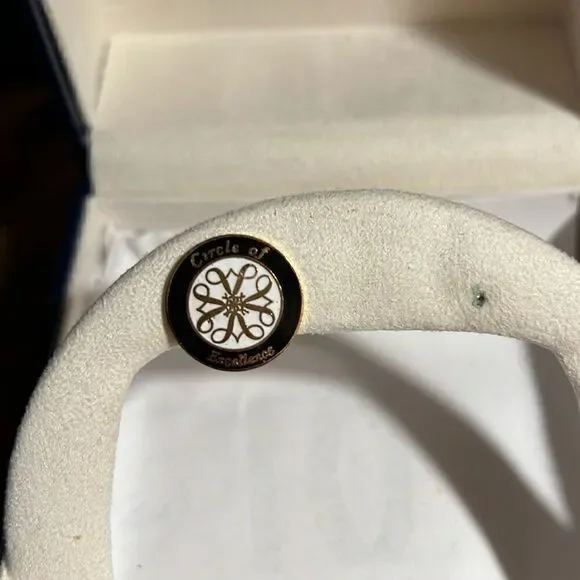 Avon Circle of Excellence pin.