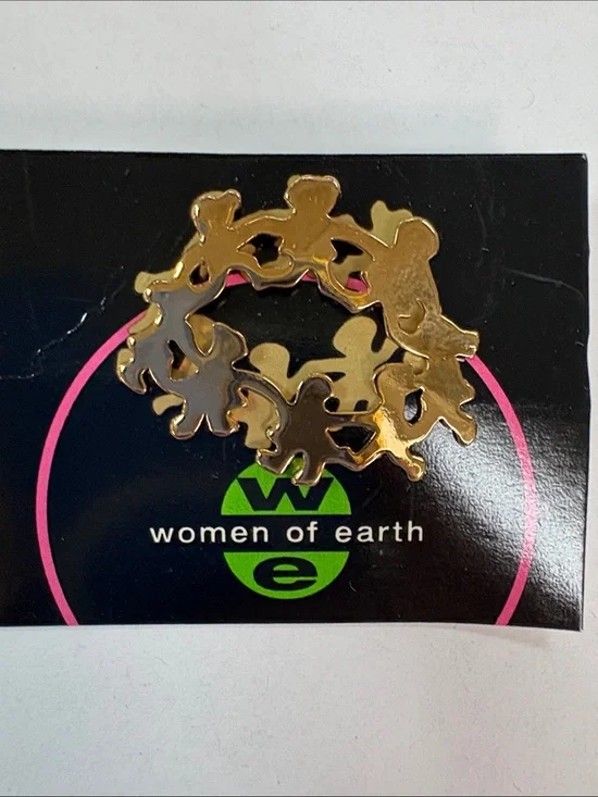 Gold Tone Circle of Figures Brooch