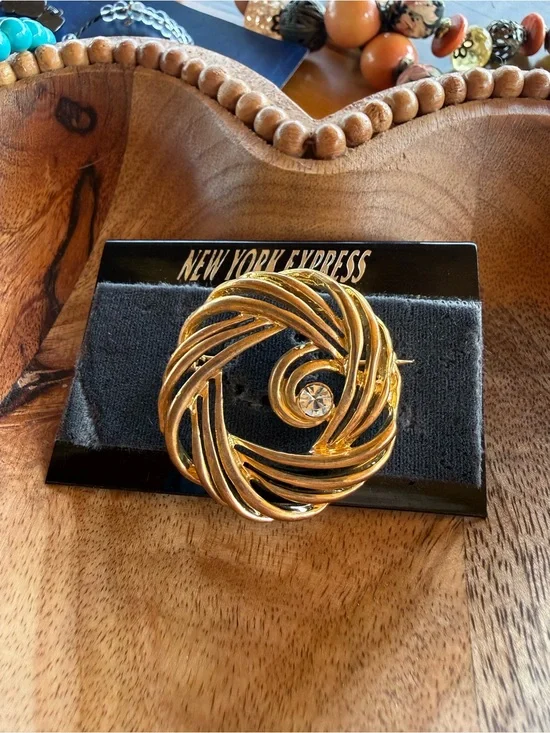 Gold-Tone Swirl Brooch with Clear Crystal Accent