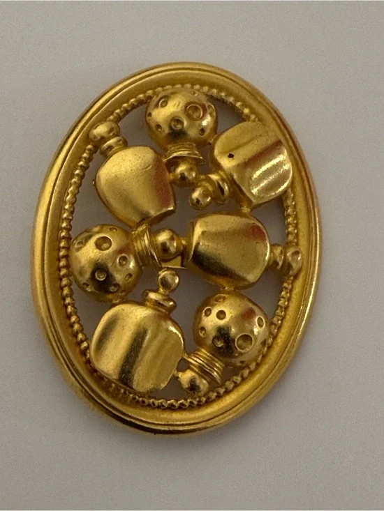 Gold Tone Oval Decorative Brooch