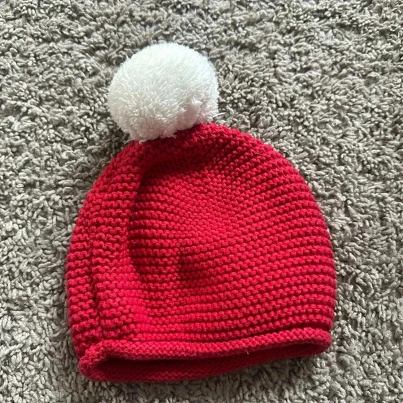 Red and white beanie.