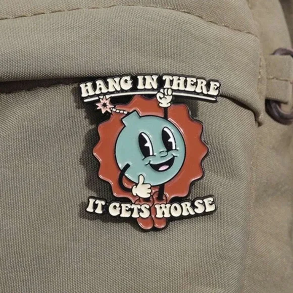 Blue red bomb Hang in There uplifting enamel pin backpack bag hat clothes denim