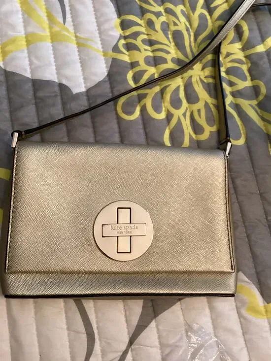 Kate Spade New York Newbury Lane Sally Crossbody bag in metallic gold