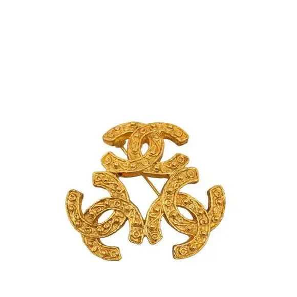 CHANEL Gold Logo Brooch
