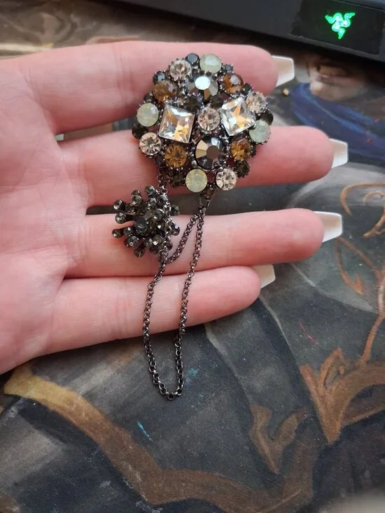 Unusual Sparkly dangle brooch