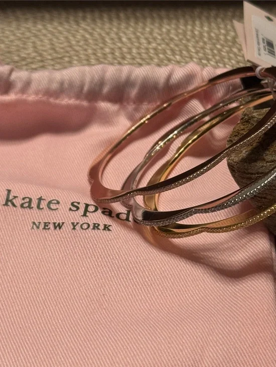 kate spade trio of metallic bangles in rose gold, gold, and silver