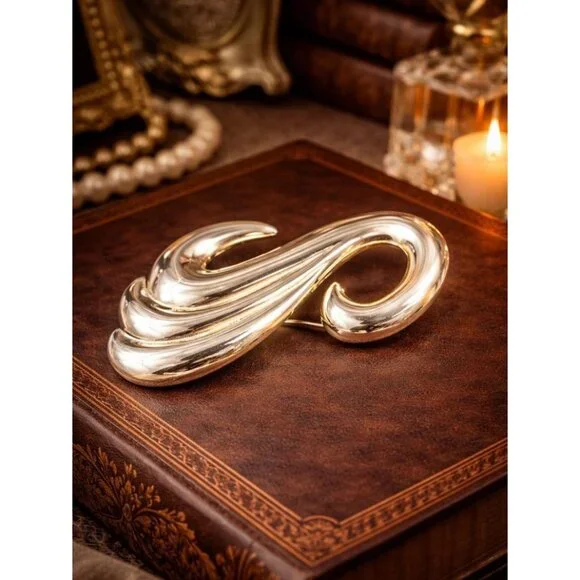 Vintage 80s gold tone sculptural swirl brooch large abstract high polish