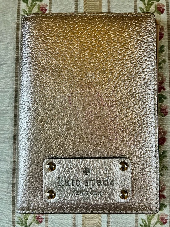 kate spade Metallic Rose Gold Pebbled Passport Cover