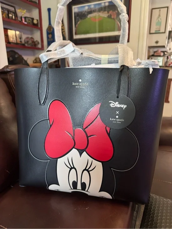 kate spade black leather tote with red Minnie Mouse bow